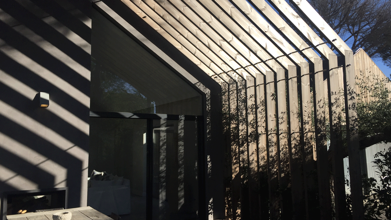 Dappled light on a terrace at Sublime Comporta