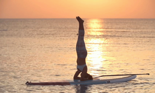 Paddleboarding at sunset